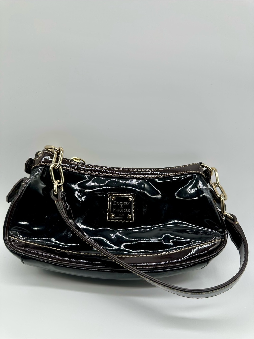 Dooney & Bourke Black Patent Leather Shoulder Bag with Gold Hardware